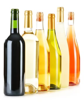 Composition with variety of wine bottles isolated on white