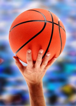Hands catching basketball