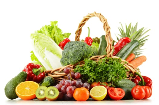 Wicker basket with groceries isolated on white background