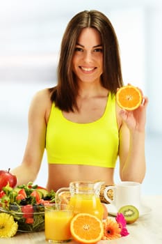 Young woman having breakfast. Balanced diet.