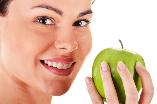 Portrait of young woman holding apple isolated on white