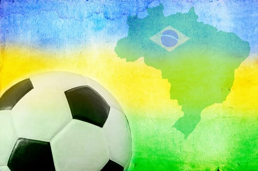 Vintage photo of soccer ball, Brazil map and the colors of the flag