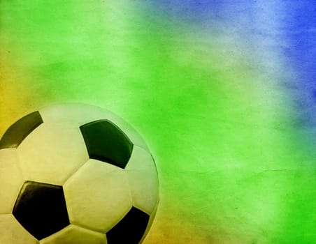 Vintage photo - Soccer ball and the colors of Brazil flag