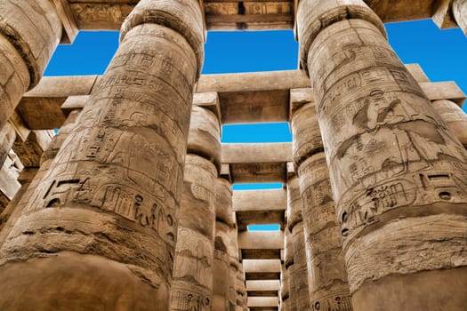 Close up of columns covered in hieroglyphics, Karnak, Egypt.