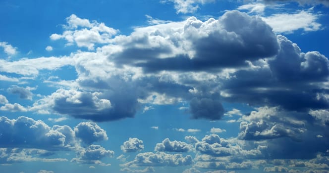 Blue sky background with a tiny clouds