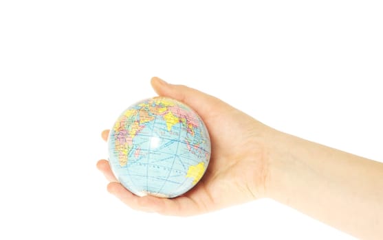 Hand holdings a globe on a white