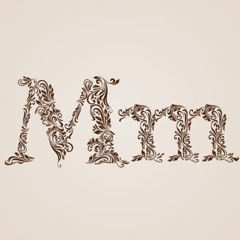 Handsomely decorated letter m in upper and lower case.