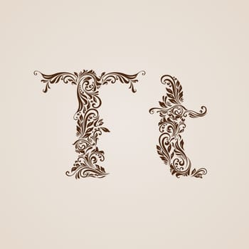 Handsomely decorated letter t in upper and lower case.
