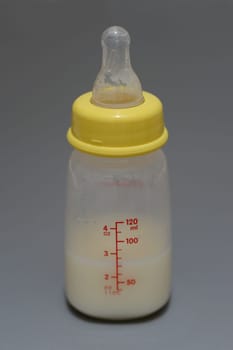 A close up shot of a baby bottle