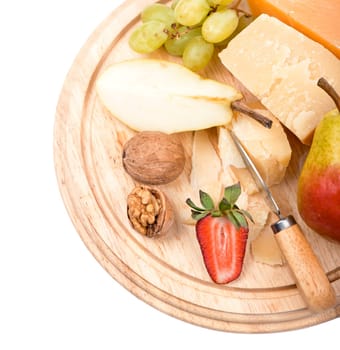 cheese and fruit on a white background