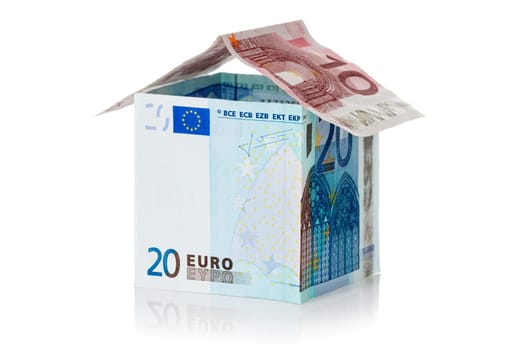 House made of euro money, isolated on white background