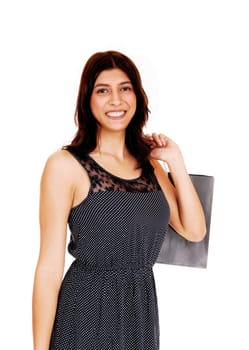 A halve size picture of a young pretty woman with a grey shopping bag.over her shoulder, isolated for white background..