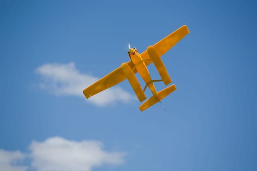 Radio controlled Hydroplane flying over the Guadiana river surface, Badajoz, Spain