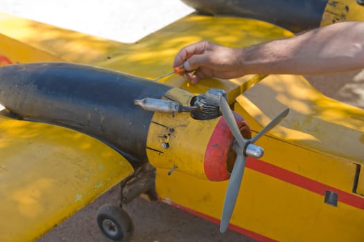 Radio controlled Hydroplane been fixed on Guadiana riverside, Badajoz, Spain