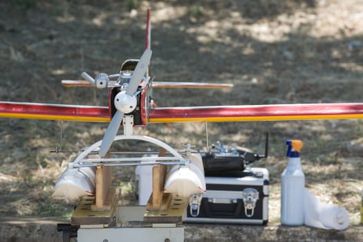Radio controlled Hydroplanes on riverside during an exhibition show