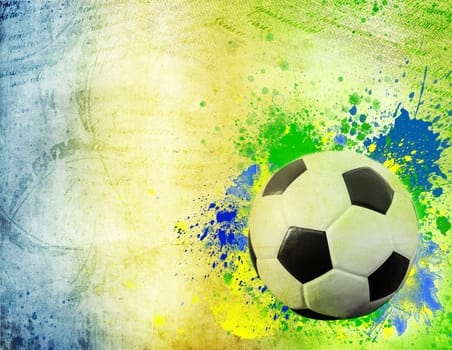 Vintage photo of soccer ball and the colors of the Brazil flag