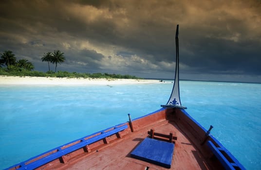.On a Dhoni sailing ship in the island world in the Northmale Atoll on the islands of the Maldives in the Indian Ocean.