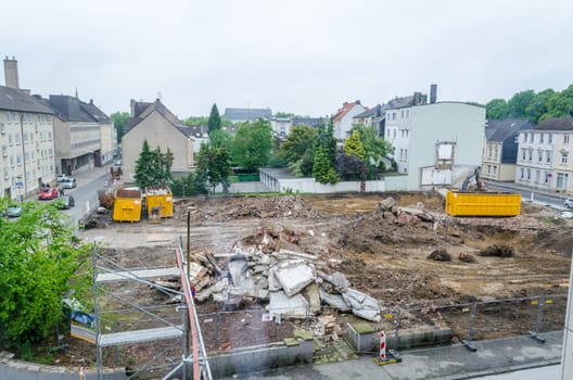 Demolition of an old office building in a city center.
