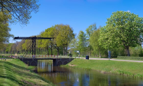 small drawbridge over a canal in the netherlands