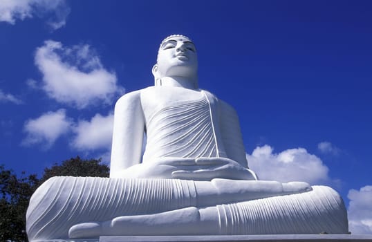 A Buddha statue at Mihintale in the south of the island of Sri Lanka in the Indian Ocean.