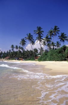A beach at Hikkaduwa in the south of Sri Lanka in Asia.