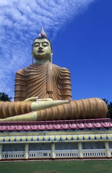 A buggha figure at the Weherahena Temple in south Sri Lanka in Asia.