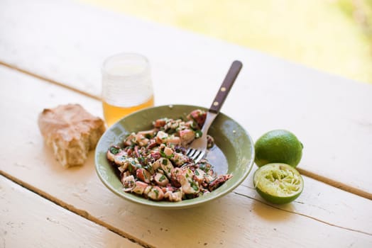 Octopus salad with olive oil, lime and parsley