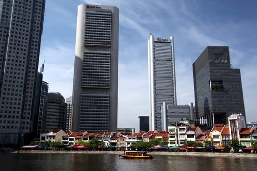The skyline in the banking district of Singapore in the island state of Singapore in Asia.