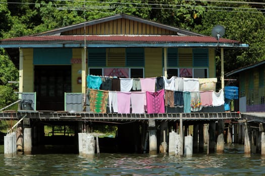 A house in the pile-building town of Kampung Ayer in the center of the capital Bandar Seri Begawan in the kingdom of Brunei Darussalam on Borneo in South East Asia