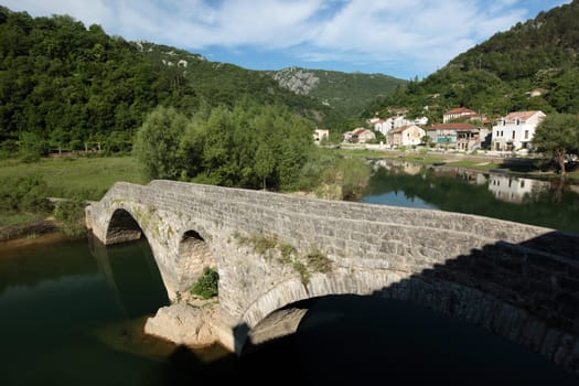 The mountain village of Rijeka Crnojevica in Montenegro in the Balkans in Europe.