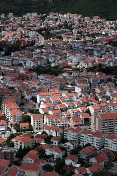 The modern center of the Adriatic city of Budva with many new apartments in Montenegro in the Balkans on the Mediterranean Sea in Europe.