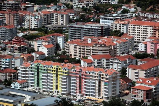 The modern center of the Adriatic city of Budva with many new apartments in Montenegro in the Balkans on the Mediterranean Sea in Europe.