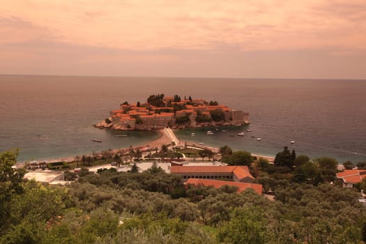 The hotel island Sveti Stefan on the Mediterranean Sea in Montenegro in the Balkans in Europe.