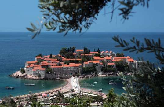 The hotel island Sveti Stefan on the Mediterranean Sea in Montenegro in the Balkans in Europe.