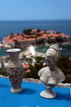 The old town island of Sveti Stefan in the Adriatic Sea on the coast in Montenegro in the Balkans on the Mediterranean Sea in Europe.
