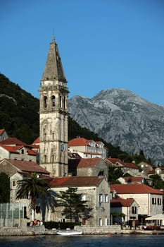 The center of the old town of Persat in the inner bay of Kotor on the Mediterranean Sea in Montenegro in Europe.