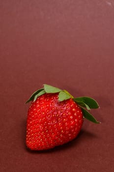 Fresh Ripe Strawberry Fruit on a Colored Background