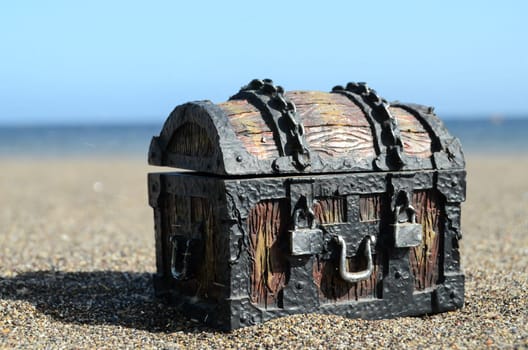 Old Classic Wood and Iron Treasure Chest on the Beach