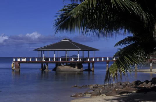 A hotel beach on the island of Praslin in the Seychelles in the Indian Ocean.
