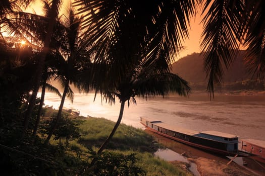 The landscape on the Mekong River in the old town of Luang Prabang in central Laos of Laos in South East Asia.