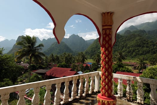 A temple in the countryside at Vang Vieng in the mountainous region of the national road 13 between Vang Vieng and Luang Prabang in central Laos of Laos in South East Asia.