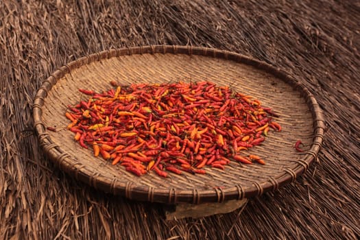 Chili pods are dried at the air in the mountainous region near the village of Kasi on the national road 13 between Vang Vieng and Luang Prabang in central Laos of Laos in South East Asia.