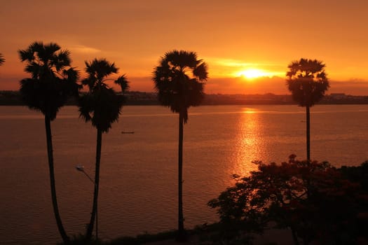 The landscape of the border river Mekong River in the town of Tha Khaek in central Laos on the border with Thailand in South East Asia.