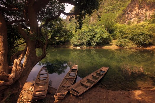 The landscape on the Nam Don or Don River near the village of Tha Falang of Tham Pa Fa near the town of Tha Khaek in central Laos on the border with Thailand in South East Asia.