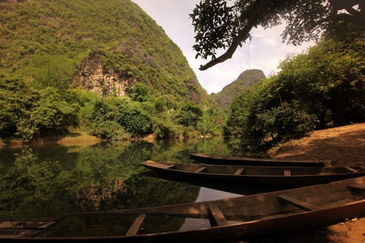 The landscape on the Nam Don or Don River near the village of Tha Falang of Tham Pa Fa near the town of Tha Khaek in central Laos on the border with Thailand in South East Asia.