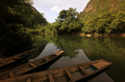 The landscape on the Nam Don or Don River near the village of Tha Falang of Tham Pa Fa near the town of Tha Khaek in central Laos on the border with Thailand in South East Asia.