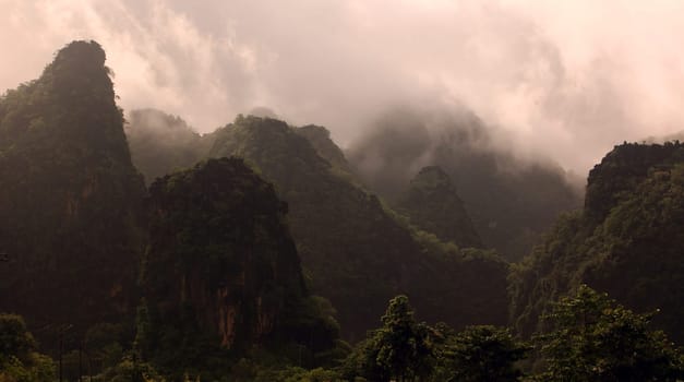 The hilly landscape on highway 12 between the city of Tha Khaek and the village of Mahaxai Mai in central Laos on the border with Thailand in South East Asia.