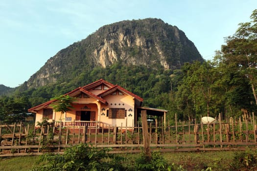 The hilly landscape on highway 12 between the city of Tha Khaek and the village of Mahaxai Mai in central Laos on the border with Thailand in South East Asia.