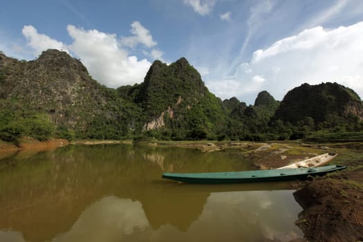 The hilly landscape on highway 12 between the city of Tha Khaek and the village of Mahaxai Mai in central Laos on the border with Thailand in South East Asia.