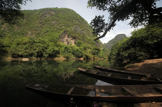 The landscape on the Nam Don or Don River near the village of Tha Falang of Tham Pa Fa near the town of Tha Khaek in central Laos on the border with Thailand in South East Asia.